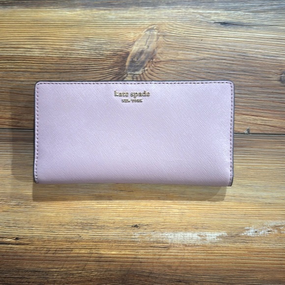 kate spade Handbags - Kate Spade light pink/mauve wallet